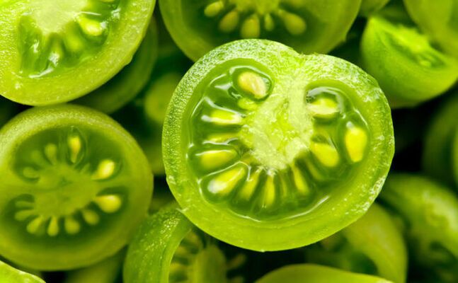 green tomato against varicose veins